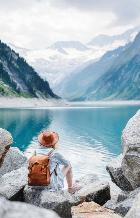 Serene moments by the lake – where adventure meets tranquility. 🌿✨ #LakeTahoeVibes Travel image. Traveler look on the mountain lake. Travel and active life concept.